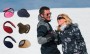 ski couple holding hands